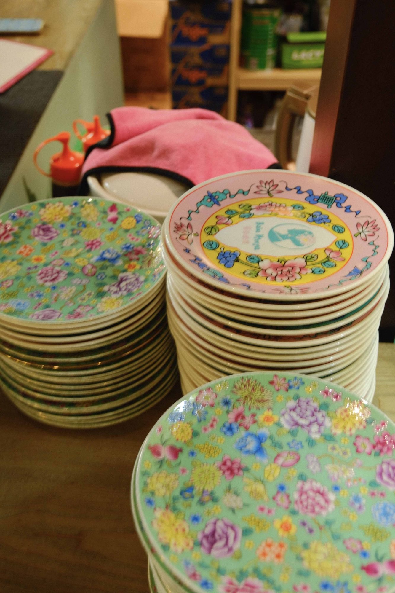 Stack of ornately patterned porcelain plates