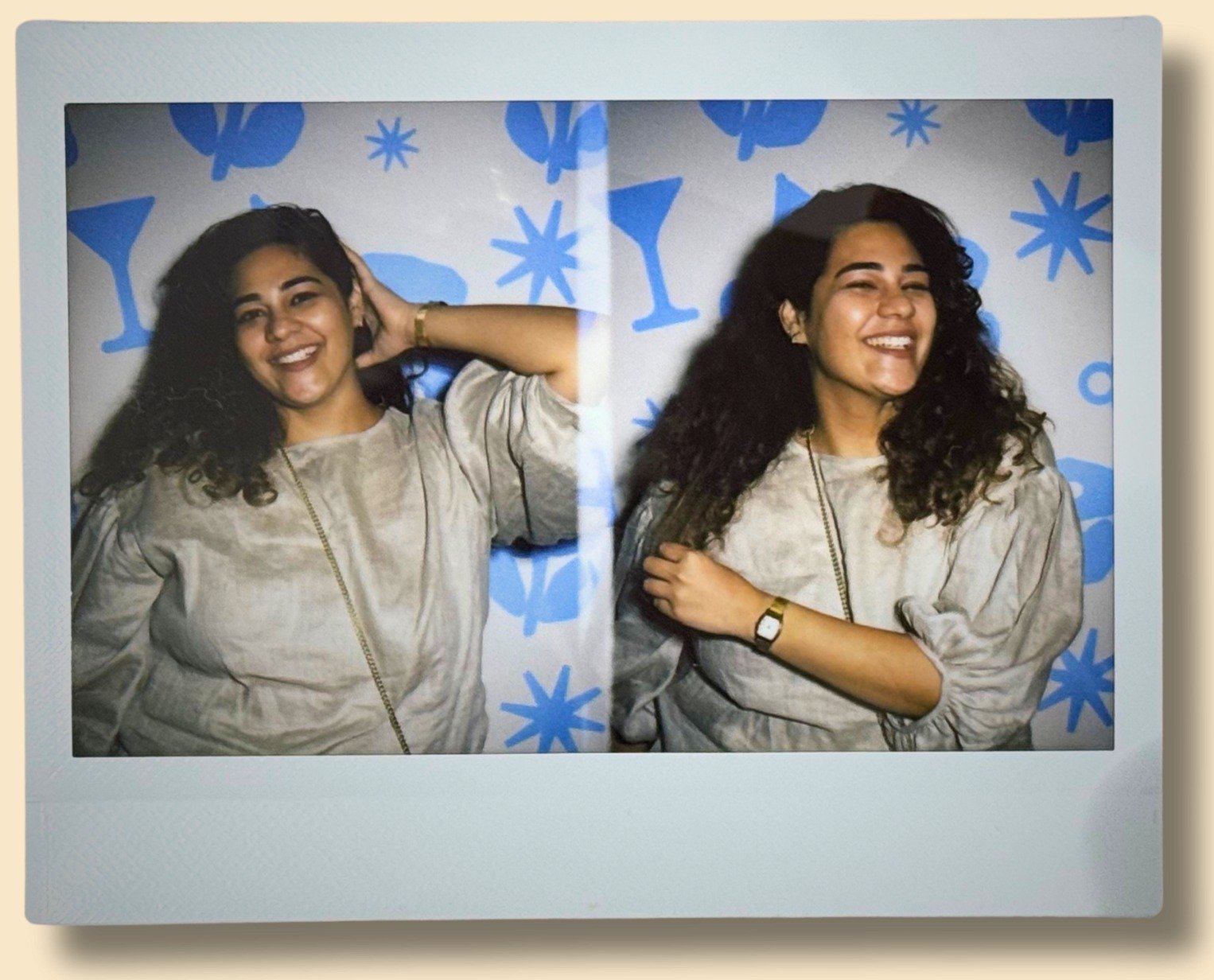 Divisha Bhatia laughing with a friend in a two-frame photobooth polaroid